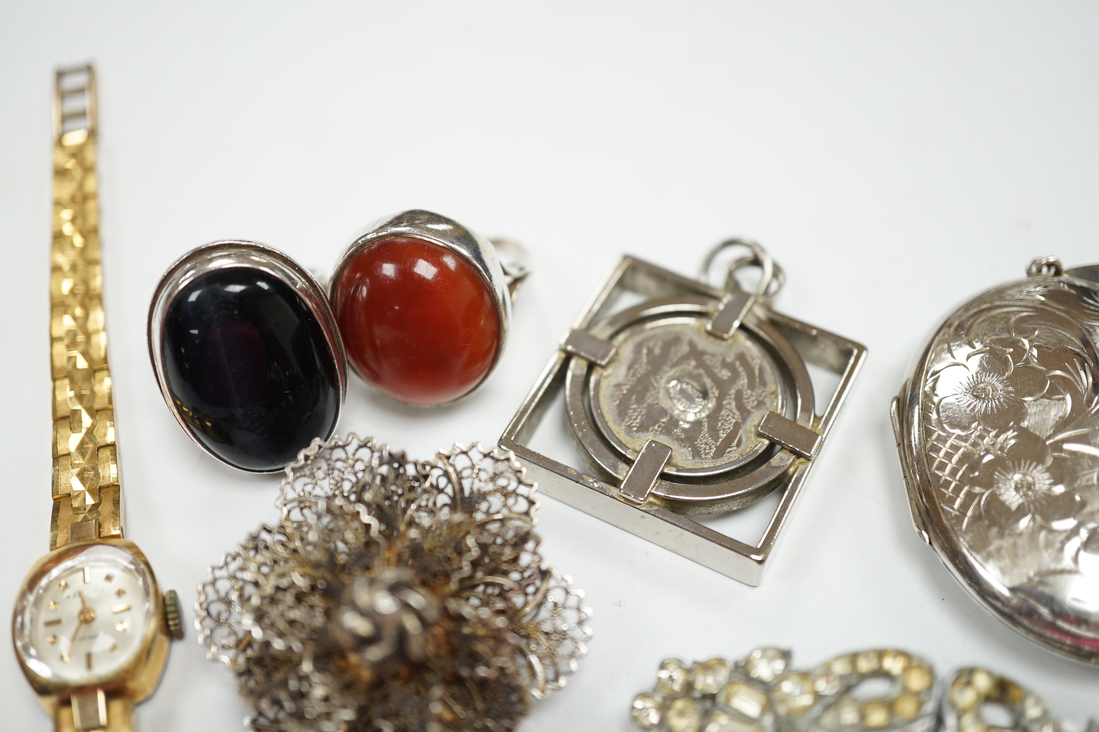 A silver and cabochon set dress ring, mixed costume jewellery and a lady's wrist watch.